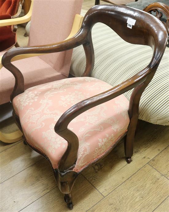 A Victorian mahogany elbow chair